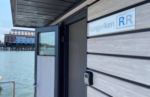 Lundby Boat Rental | Houseboat KUNGSVIKEN with roof terrace in the center of Gothenburg