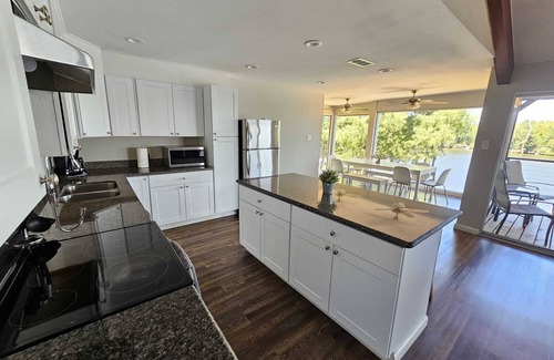 Barrett House | Houston Riverfront Getaway house with pool and hot tub