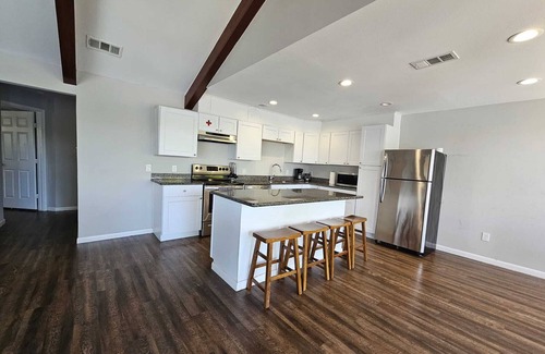 Barrett House | Houston Riverfront Getaway house with pool and hot tub