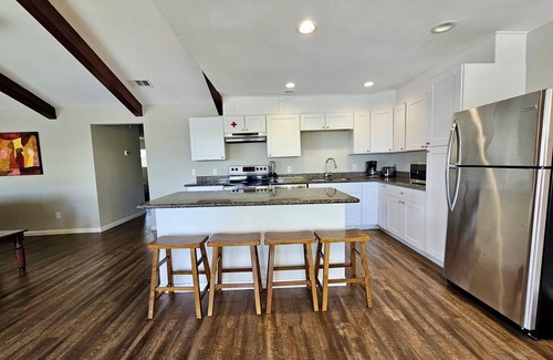Barrett House | Houston Riverfront Getaway house with pool and hot tub