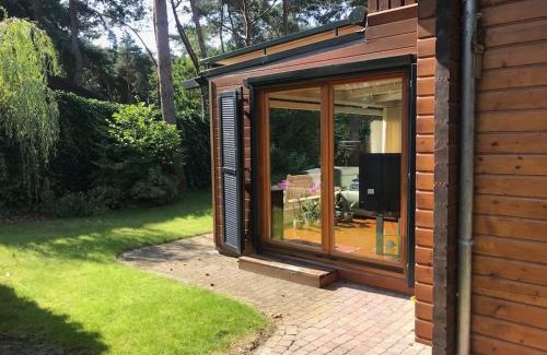 Langstraat House | Houten chalet/bungalow in het bos, sauna, jacuzzi