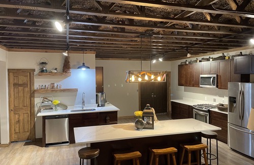 Patterson Cabin | HUGE 11 BD 6 BA CABIN! BAR AND GOLF SIMULATOR INSIDE, OUTDOOR KITCHEN/PROJECTOR
