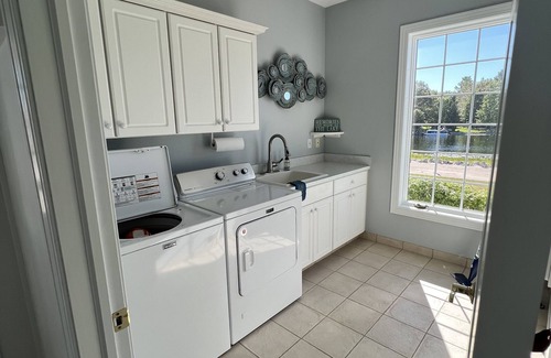 Oscoda House | Huge Cape Cod Style Home on all Sandy beach/Cedar Lake MI