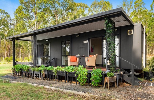 Quorrobolong Cabin | Hunter Hideaway Farm cozy cabin for two with hot tub outside the door.