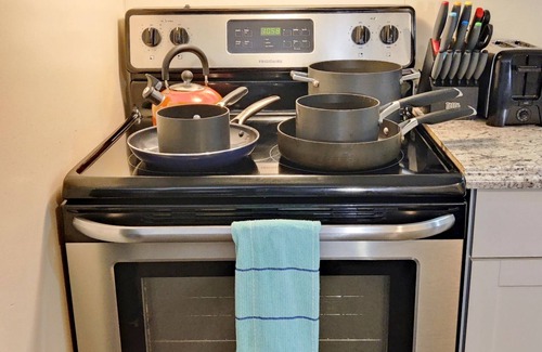 Huntington Apartment | Huntington's Hidden Gem! Private Hot Tub, King Size bed! Perfect Couple Getaway!