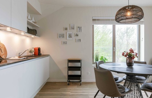 Westende Apartment | Huswell - Wide top-floor apt with private parking