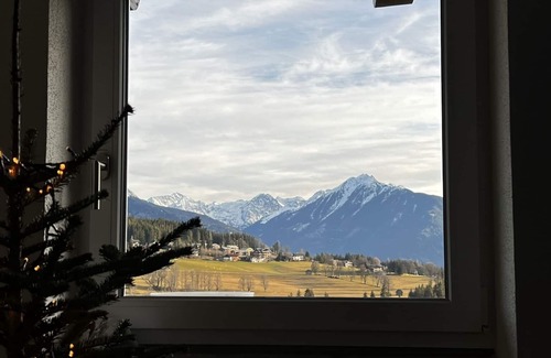 Ramsau am Dachstein Cabin | Hut with a view of the Dachstein and direct access to the ski and cross-country slopes.