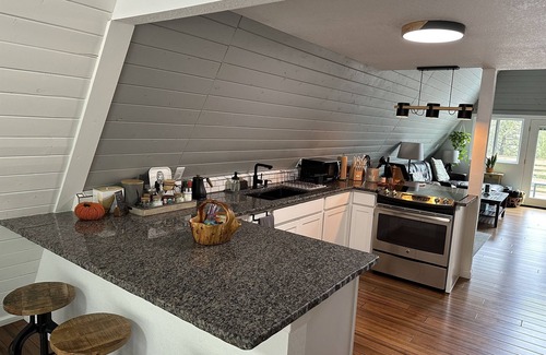 Grant Cabin | Hygge Chalet & Sauna w/Private Trail + EV Charger