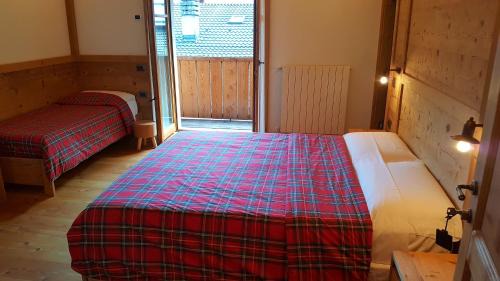 Branzi Hotel | I Riviù