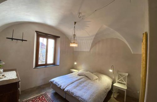 Pigna Villa | Iconic Italian Townhouse w Rooftop Terrace & Mountain View, Pigna