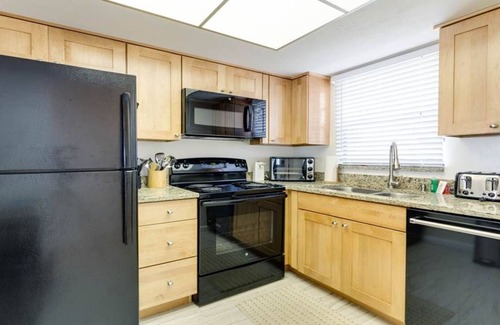 Mid Island Condo | Ideal Beachfront location, Spectacular Sunsets, Bright Lovely Corner Condo