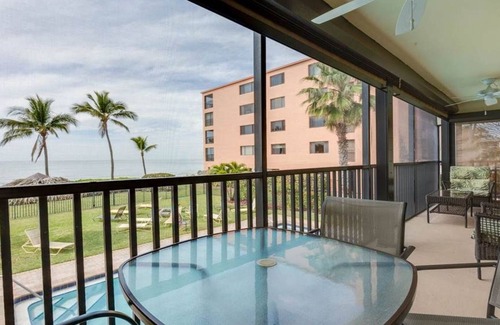 Mid Island Condo | Ideal Beachfront location, Spectacular Sunsets, Bright Lovely Corner Condo
