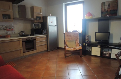 Pescantina Apartment | Ideal for Spa, food and wine tours. Italian breakfast included on bank of river