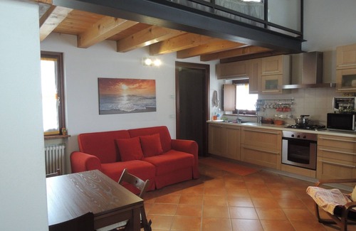 Pescantina Apartment | Ideal for Spa, food and wine tours. Italian breakfast included on bank of river