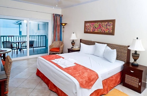 St. Lawrence Gap Hotel | Ideal Location! Onsite Pool, Kitchenette, Oceanfront, Free Parking, Near Beach