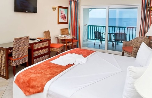 St. Lawrence Gap Hotel | Ideal Location! Onsite Pool, Kitchenette, Oceanfront, Free Parking, Near Beach