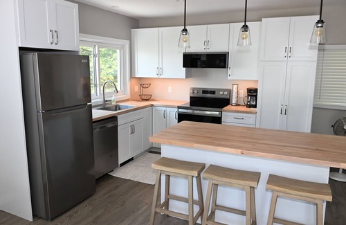 Lake Leelanau Cottage | IDEAL LOCATION @ THE NARROWS ON SOUTH LAKE LEELANAU W/DOCK.nPerfect Sunsets