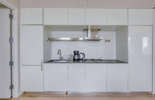 Central New York City Apartment | Ideal Midtown 2BR w/Gym & W/D, nr Rockefeller Center, by Blueground