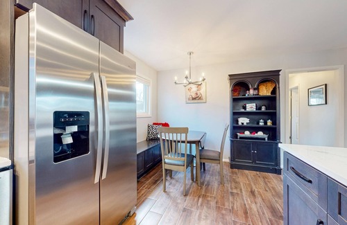 Fayetteville House | Ideally located home with enclosed yard, tiki bar, grill, smoker, & smart TVs