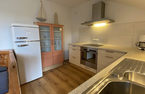 Motzach Apartment | Idyllic apartment in the countryside with west-facing balcony, parking space (wallbox) and bicycle room.