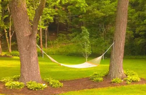 Wooster House | Idyllic Family Cabin with a Private Beach for a Getaway from Akron, Ohio