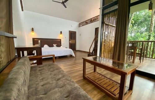 Kunchithanny Other | IlliVilla Bamboo claded single room cottage inside Organic Spices Farm in Munnar