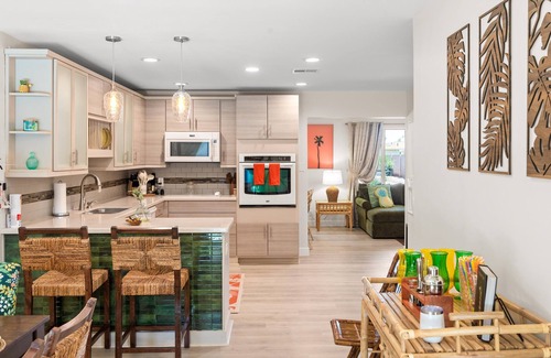 Village Grove House | Imagine landing in Scottsdale and stepping straight into your own private island oasis. At Mai Tai Manor, the days are made for poolside lounging, tiki bar cocktails, and group dinners that stretch into laughter-filled nights under string lights.