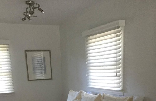 Bellport Cottage | Immaculate Bellport village cottage vacation home w/ Pool, Hot Tub, bikes & Maid