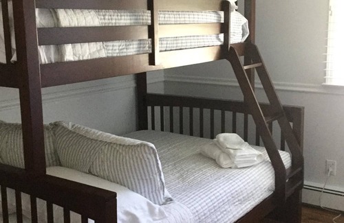 Bellport Cottage | Immaculate Bellport village cottage vacation home w/ Pool, Hot Tub, bikes & Maid