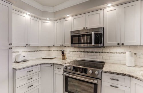 Amelia City Condo | Immaculate, directly oceanfront condo, superbly renovated.