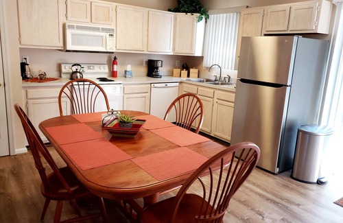 Heron Harbour Isle House | Immaculate townhome with private fenced back patio. 9.98 star rating.