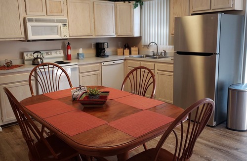 Heron Harbour Isle House | Immaculate townhome with private fenced back patio. 9.98 star rating.