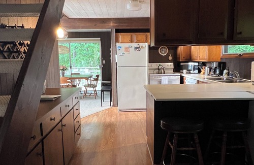 Kewadin House | Imogene's- Torch Lake cottage, waterfront w/dock