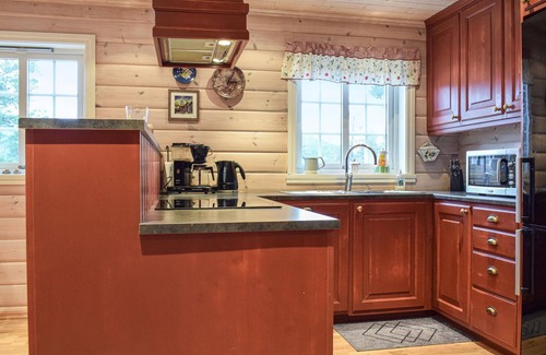 Stalheim House | Impressive, rustic log house in the tranquility of nature.