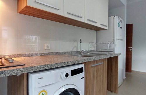 Konyaalti Condo | In Antalya, a family-friendly apartment with terrace near the sea