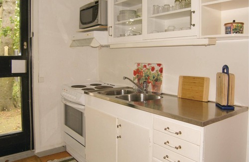 Dosjebro House | In the bustling town of Västra Karaby lies this cottage.
