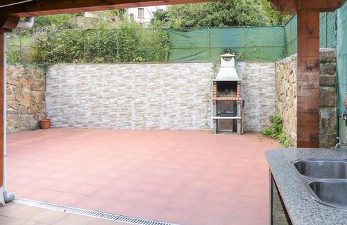 Laviana House | In the heart of Asturias welcomes you this colorful vacation home.
