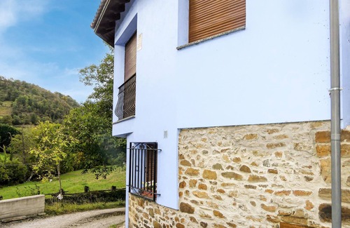 Laviana House | In the heart of Asturias welcomes you this colorful vacation home.