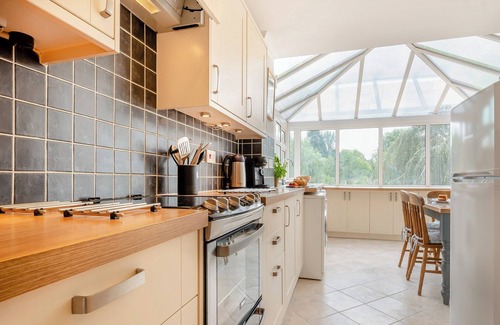 Malmesbury Cottage | In the secluded valley of Woodbridge Brook, lies The Mill Lodge.