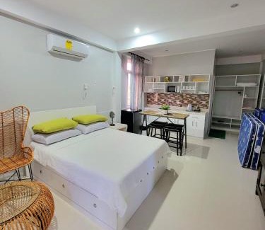 Panglao House | INATO SUITES Rm 1 1 queen bed and a pullout sofa bed