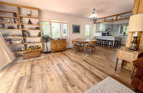 Indian River Cottage | Incredible lakefront house with cottages, dock, fire pit, decks, & amazing views
