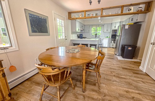 Indian River Cottage | Incredible lakefront house with cottages, dock, fire pit, decks, & amazing views