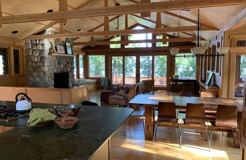 Beaver Island Cottage | Indoor/outdoor living at its best in this stunning lakeside home.