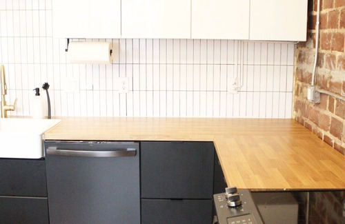 Springfield House | Industrial modern single-story home with office, yard in historic neighborhood