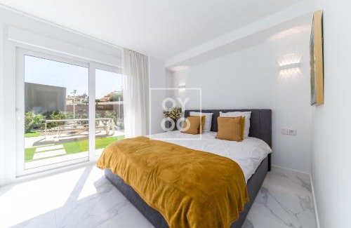 Punta Prima Apartment | Infinity Blue Luxury Flat by OYOOSTAYS