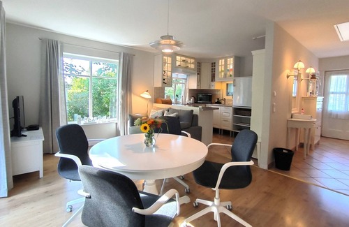 Tarp House | Inger: Modern vacation home with terrace and garden use - Holiday home Inger