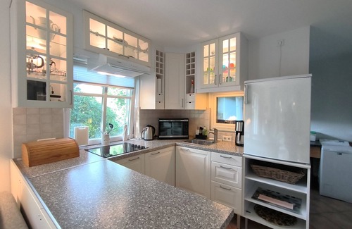 Tarp House | Inger: Modern vacation home with terrace and garden use - Holiday home Inger