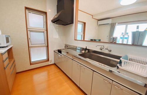 Motobu House | Inn overlooking Ie Island Saint