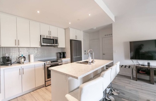 Innisfil Apartment | Innisfil 2BR Condo | Balcony, BBQ & Fire Table