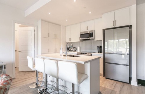 Innisfil Apartment | Innisfil 2BR Condo | Balcony, BBQ & Fire Table